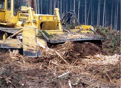 Krohns Forest Tiller while milling of trees and roots